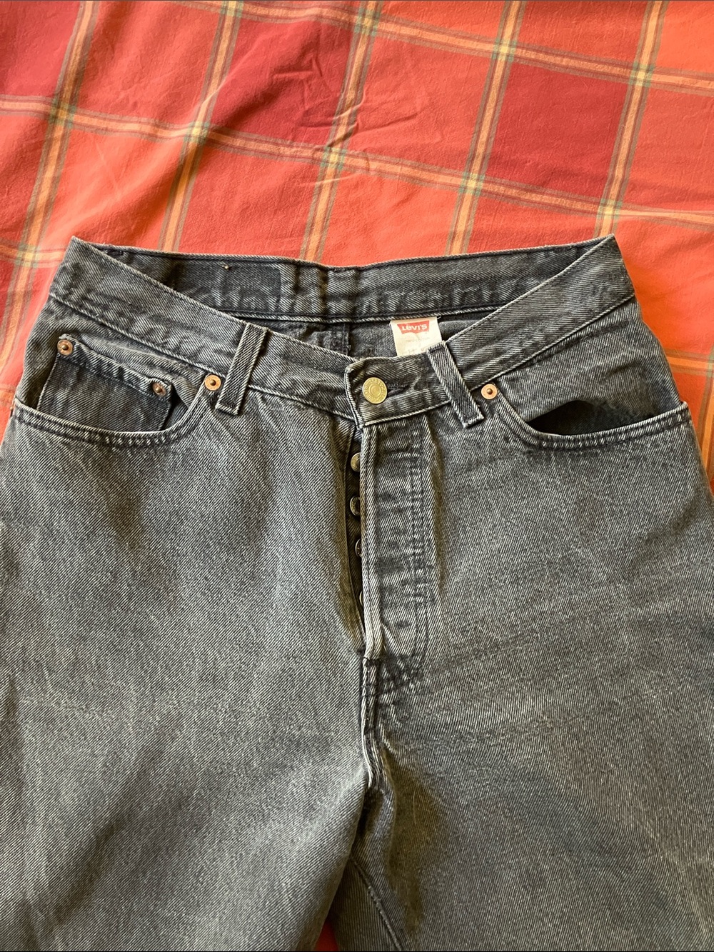 Levi's Washed Black Denim Jeans with Red Logo Tag